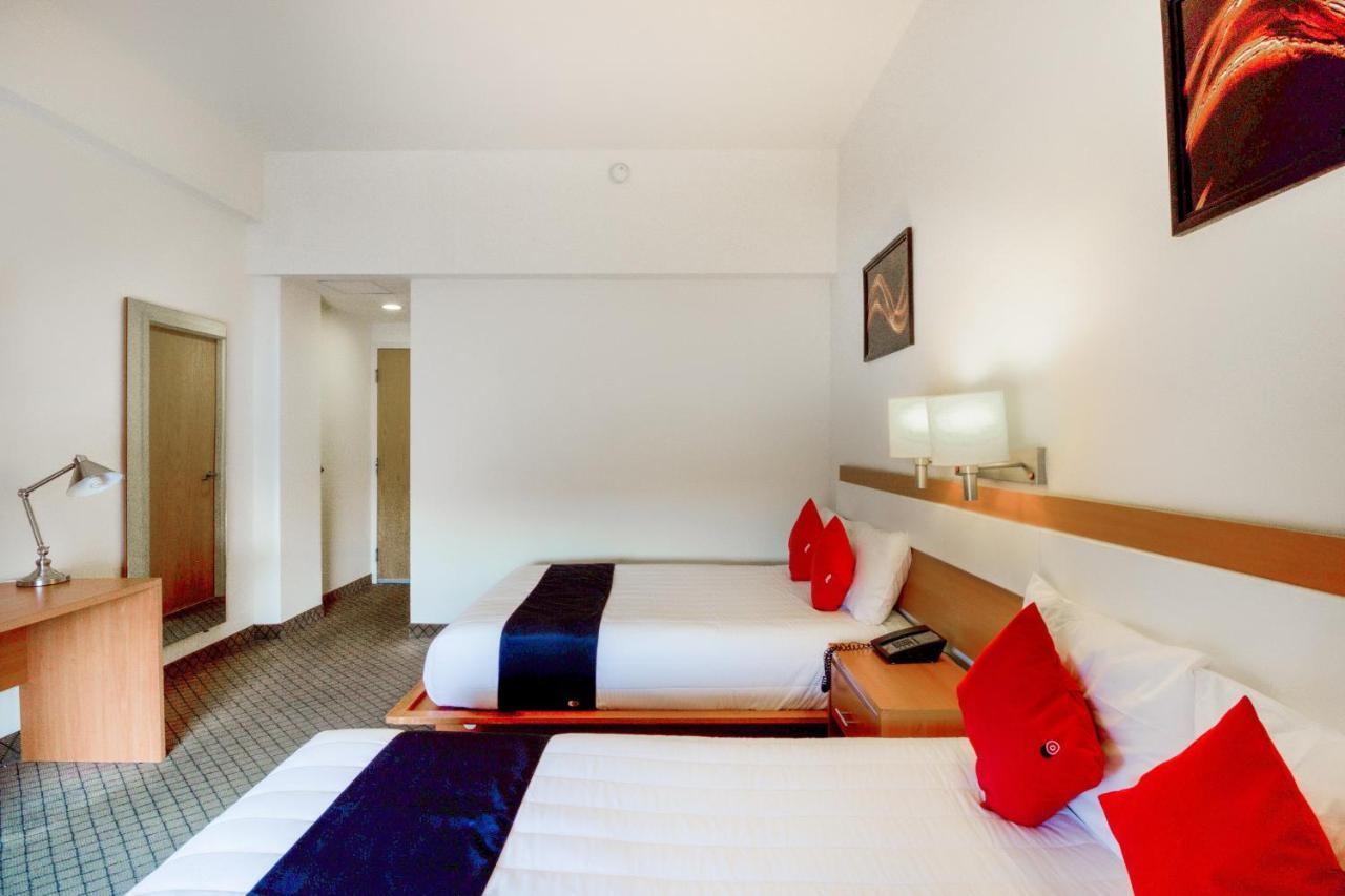Capital O Hotel Herederos, Piedras Negras Bagian luar foto